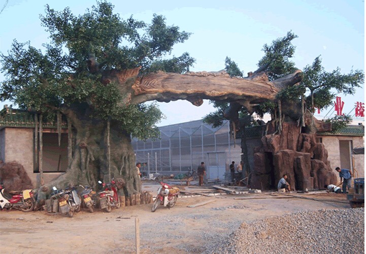 定做假树大门大型门头假山门头仿真古树景区塑石山门水泥设计施工