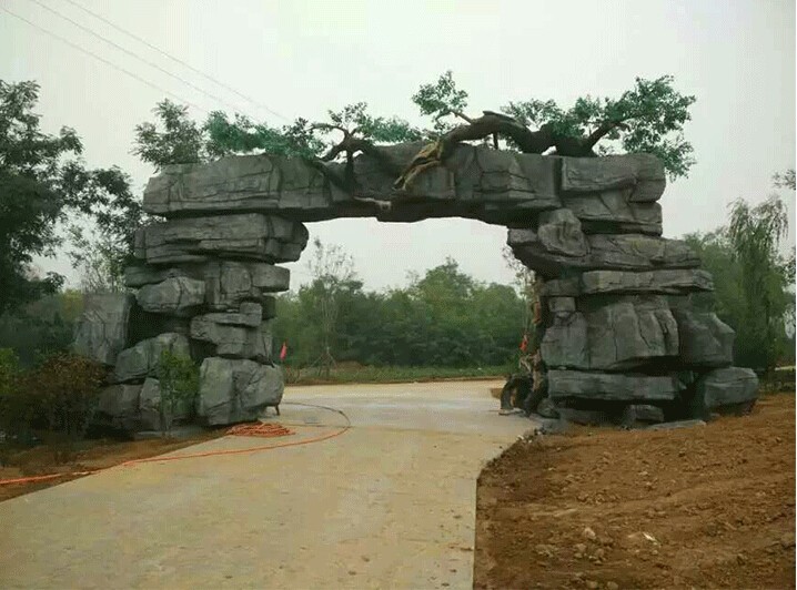 定做假树大门大型门头假山门头仿真古树景区塑石山门水泥设计施工